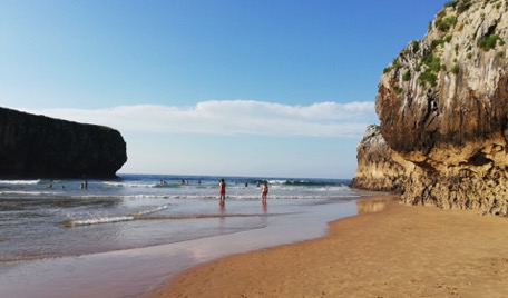 ... "opposite" there is the Atlantic beach between the cliffs ...